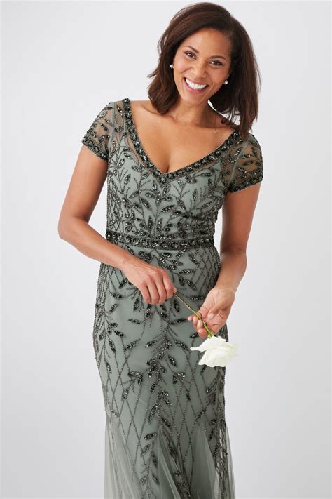 Look for styles that are fashionable not frumpy, stylish but not trendy, and are classic and sophisticated. . Mother of the bride dresses that are not frumpy